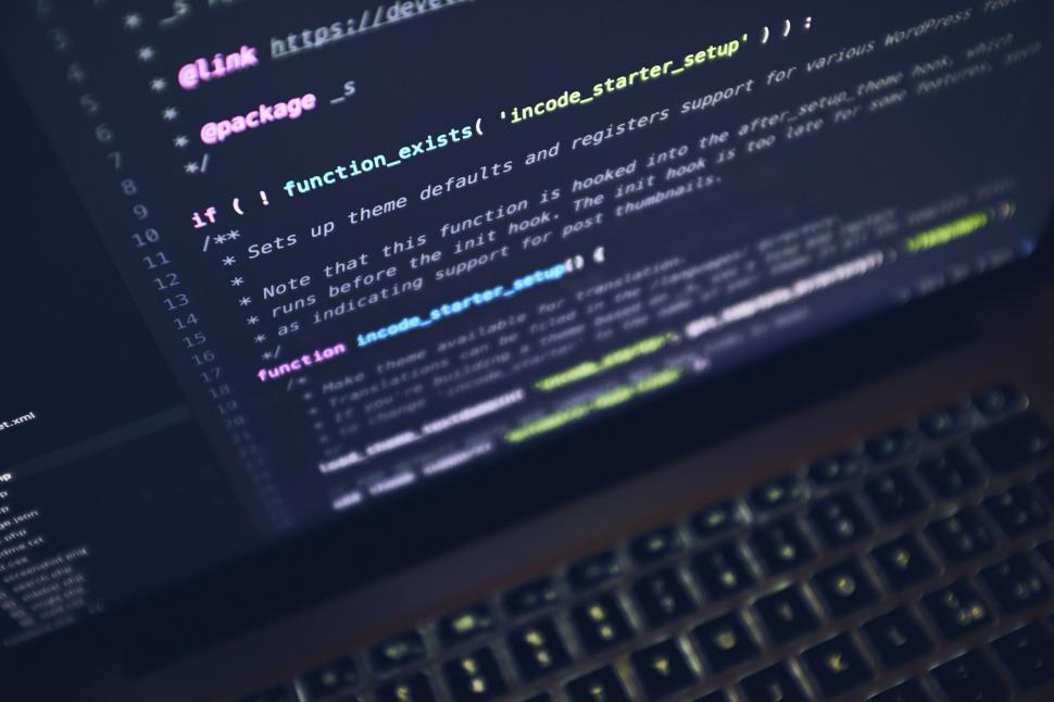 Free Image of Close-up of computer screen displaying colorful coding text lines. 