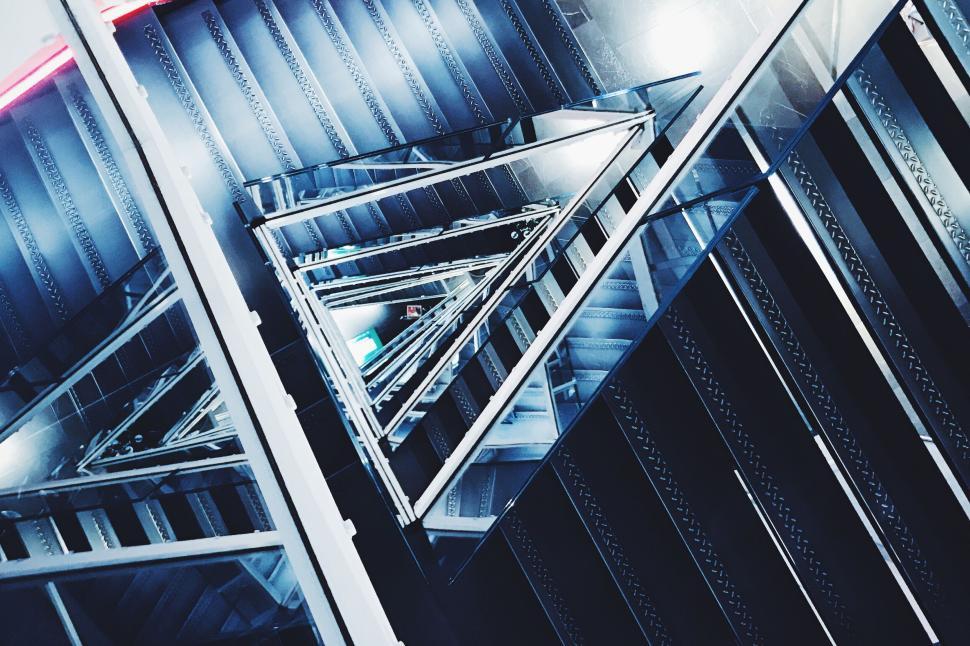 Free Image of Abstract view of modern escalators forming geometric patterns 