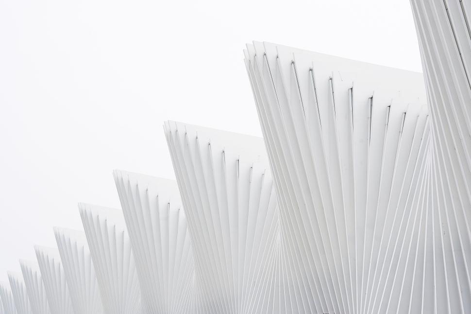 Free Image of Minimalistic white architectural design with repetitive structures 