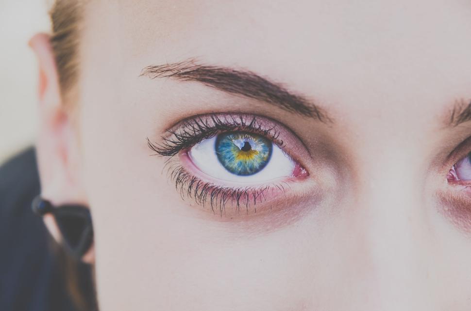 Free Image of Close-up of person s face focusing on left eye and intricate eyebrow 
