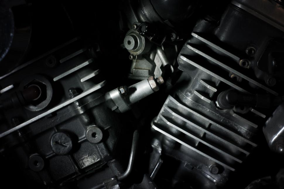 Free Image of Close-up of mechanical engine parts in black and white tones. 