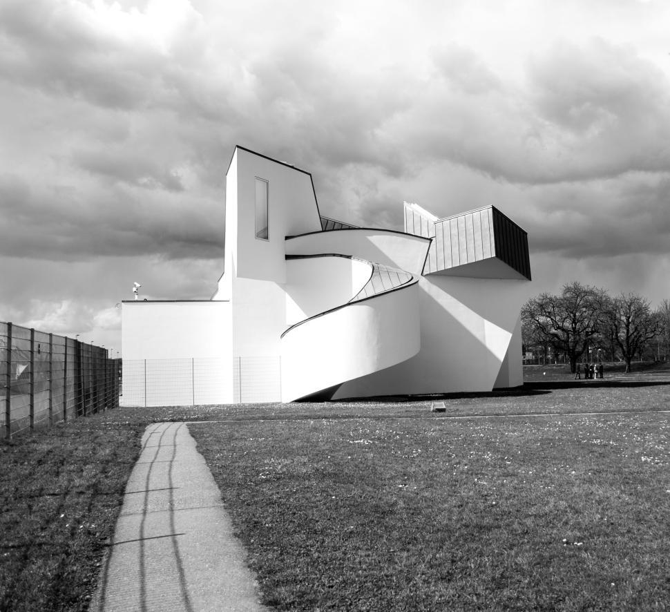 Free Image of Modern architectural building with spiral design on sunny day. 