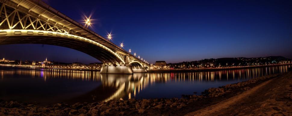 Free Image of City bridge illuminated beautifully against a twilight sky view. 