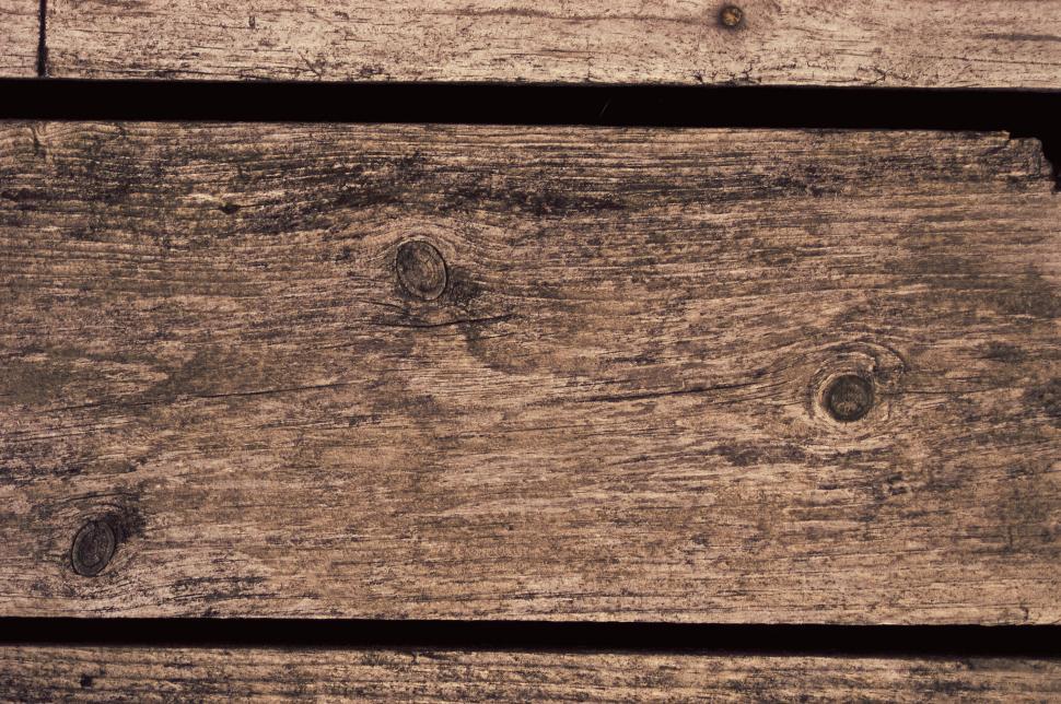 Free Image of Close-up view of aged wooden planks with visible grain 