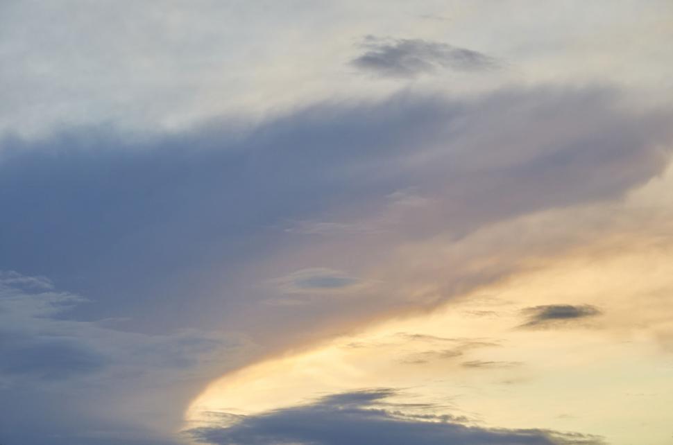 Free Image of Dramatic sky with colorful clouds at sunset time. 