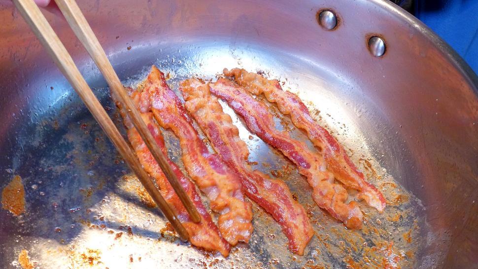 Free Image of Frying Bacon Strips 