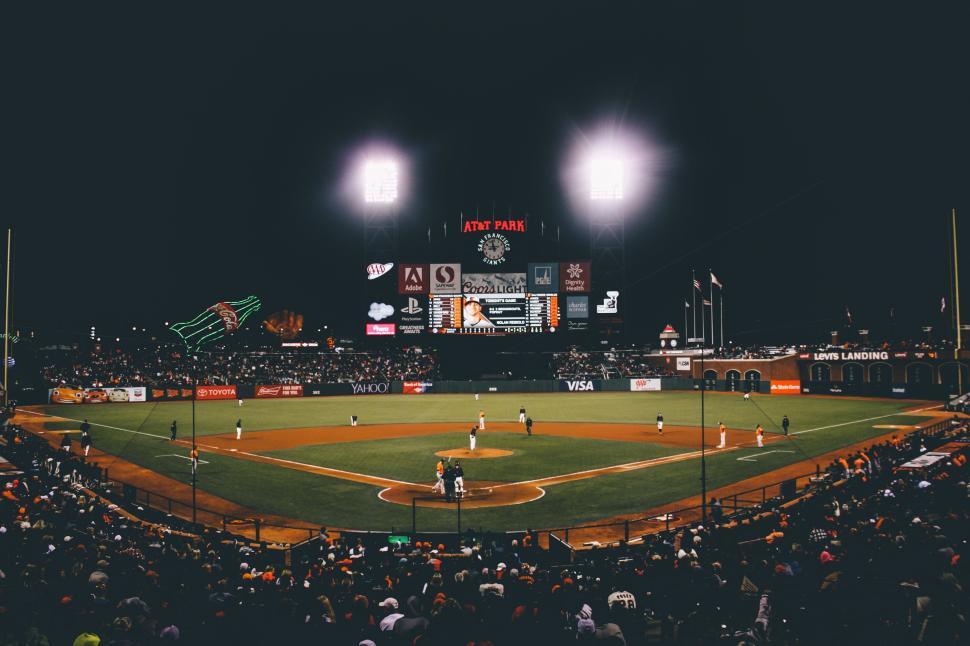 Free Image of Baseball game at a well-lit stadium during nighttime event. 