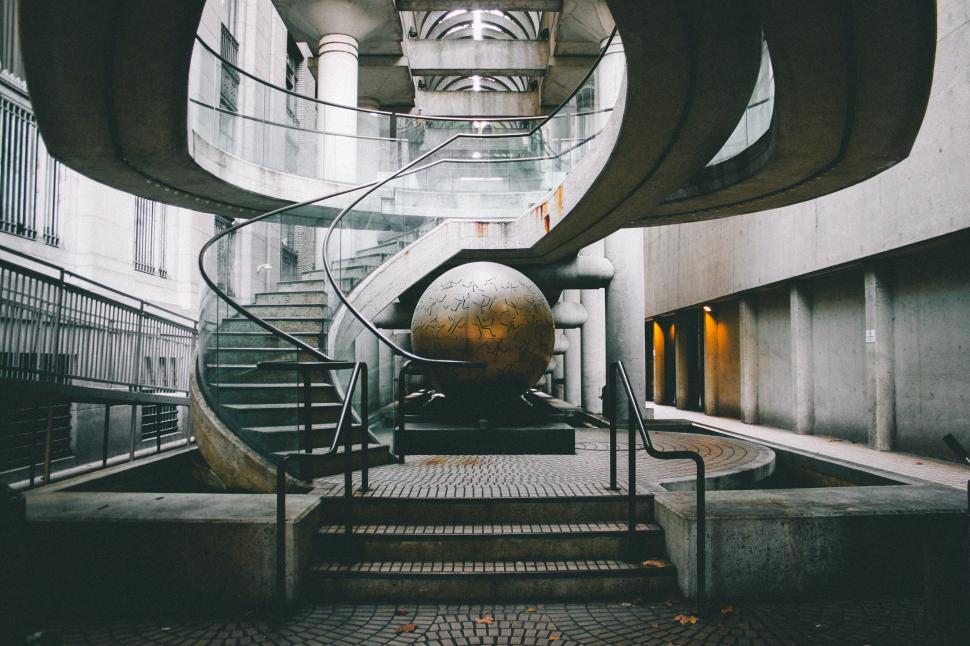 Free Image of Abstract sculpture with staircase in modern architectural setting. 
