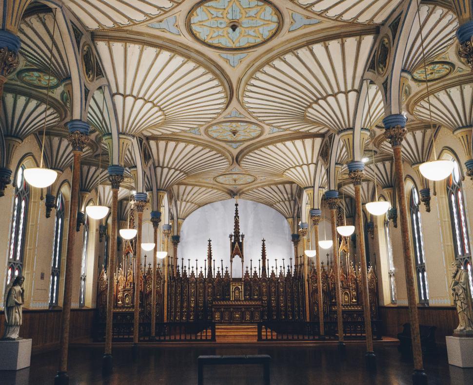 Free Image of Ornate ceiling and altar inside a beautifully designed church 