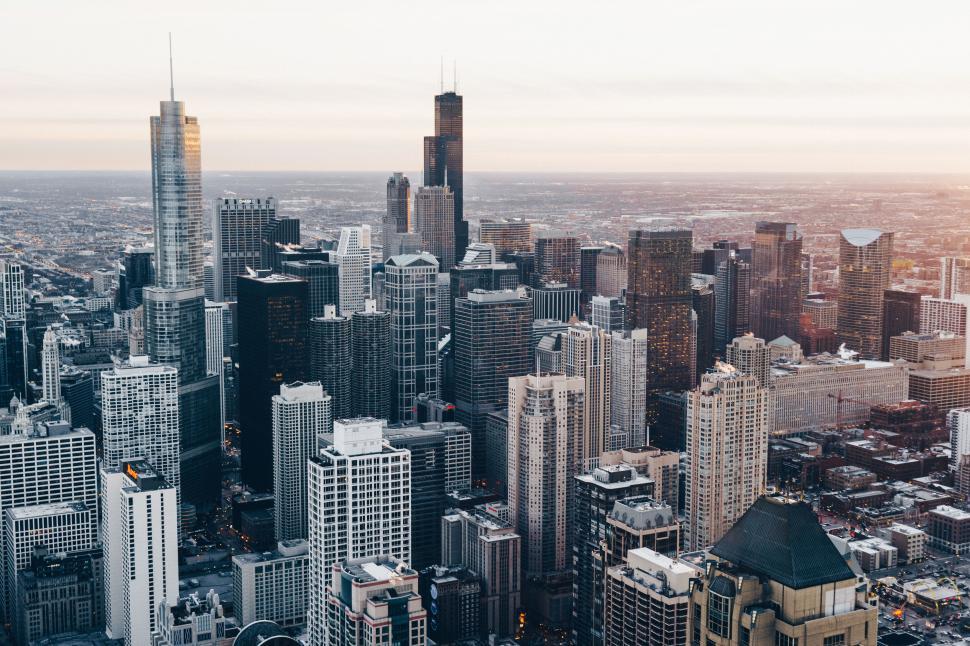 Free Image of Panoramic view of Chicago skyline at sunset, skyscrapers. 