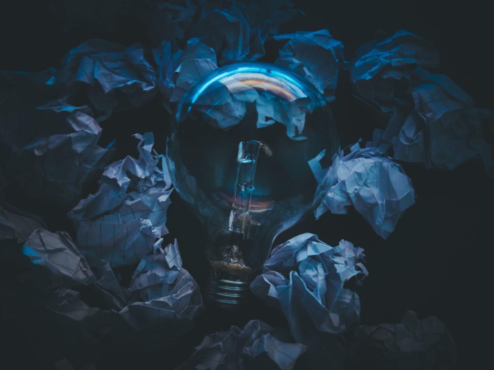 Free Image of Conceptual image of a light bulb with crumpled paper. 
