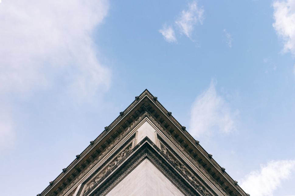 Free Image of Upward view of building corner with sky background 