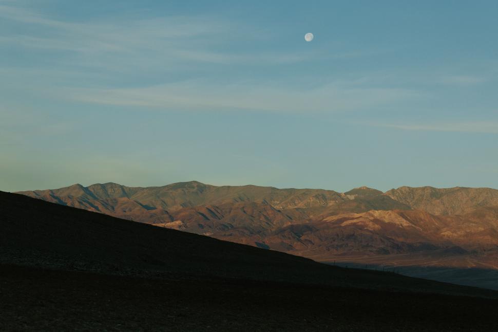 Free Image of Majestic mountain range with moon at twilight 
