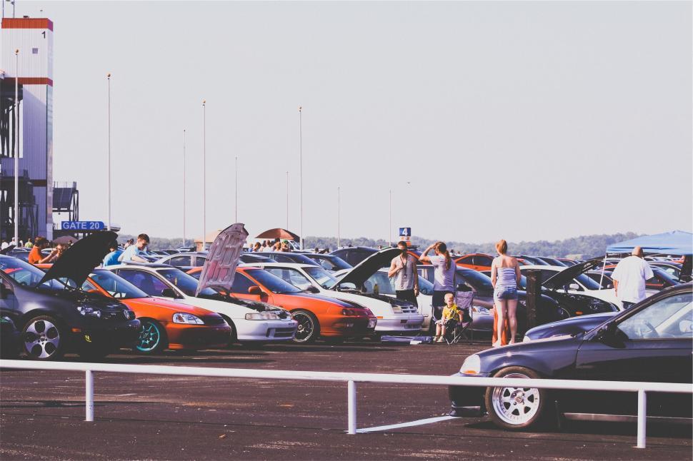 Free Image of Car show with various models displayed outdoors. 