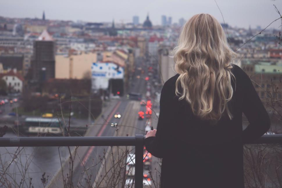 Free Image of Woman overlooking cityscape from a high viewpoint 