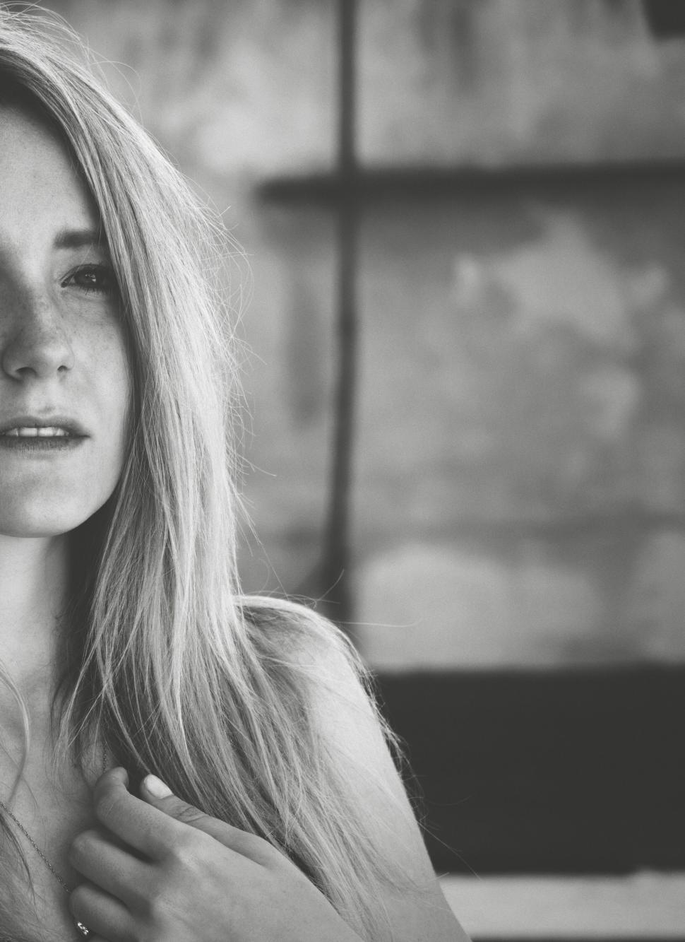Free Image of Portrait of a woman with serene expression outside 