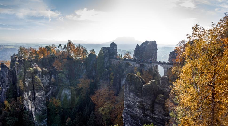 Free Image of Magnificent rock formations with an iconic bridge view 