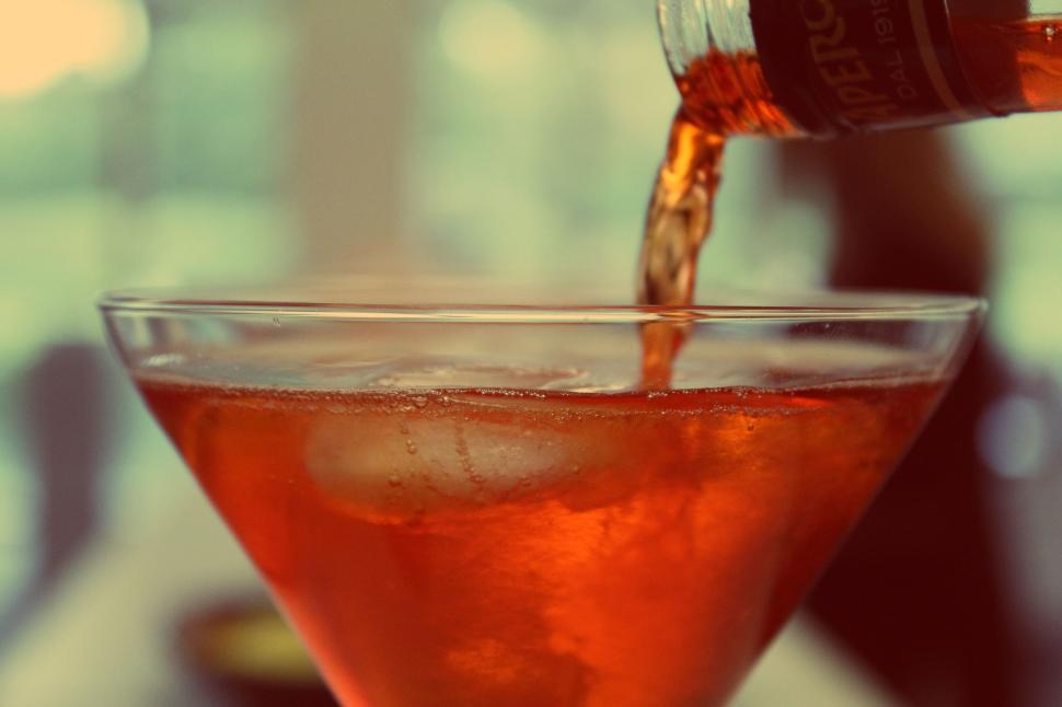 Free Image of Refreshing Aperol spritz being poured into a glass 