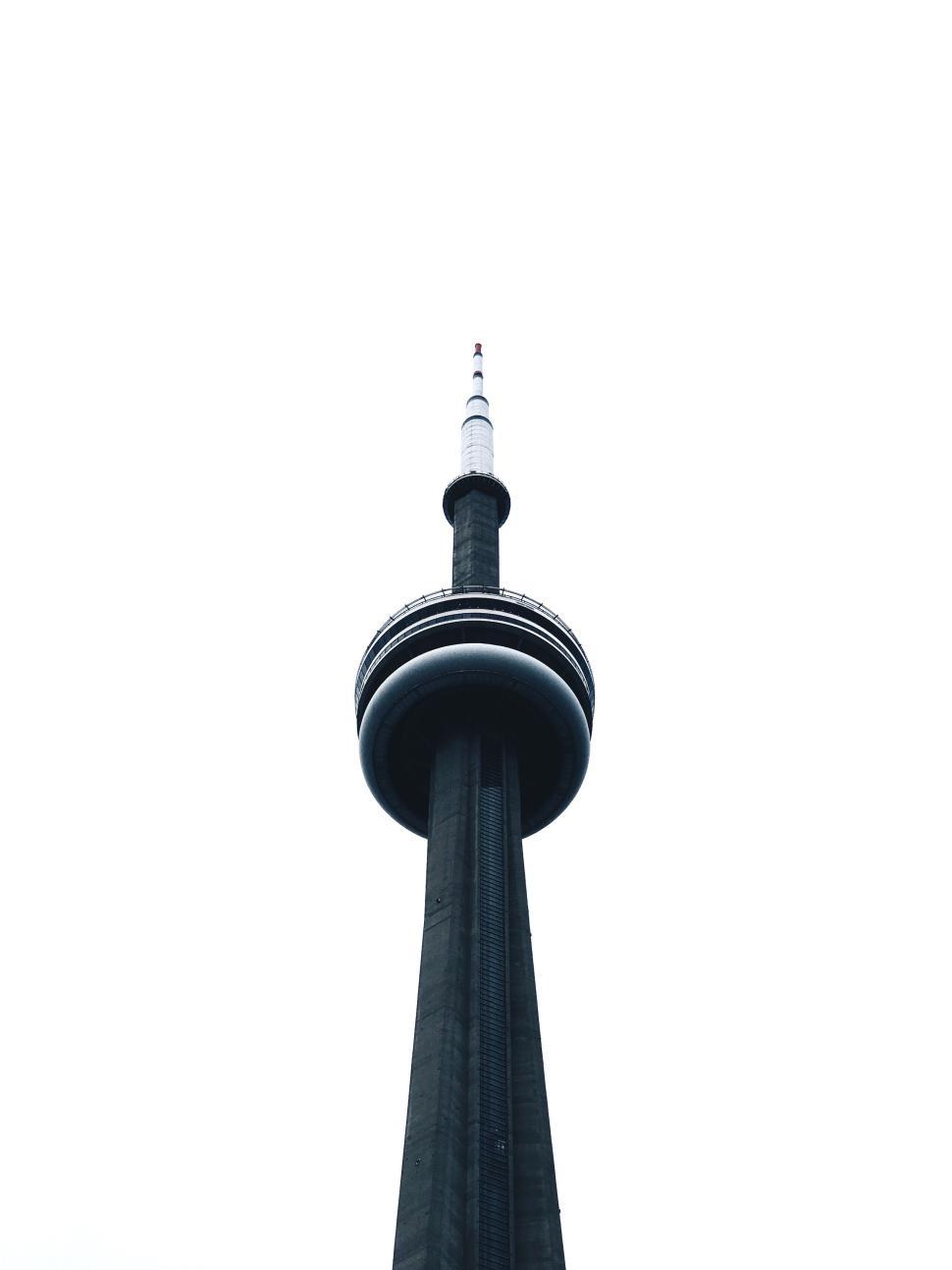 Free Image of Tall tower reaching towards the sky with white background 
