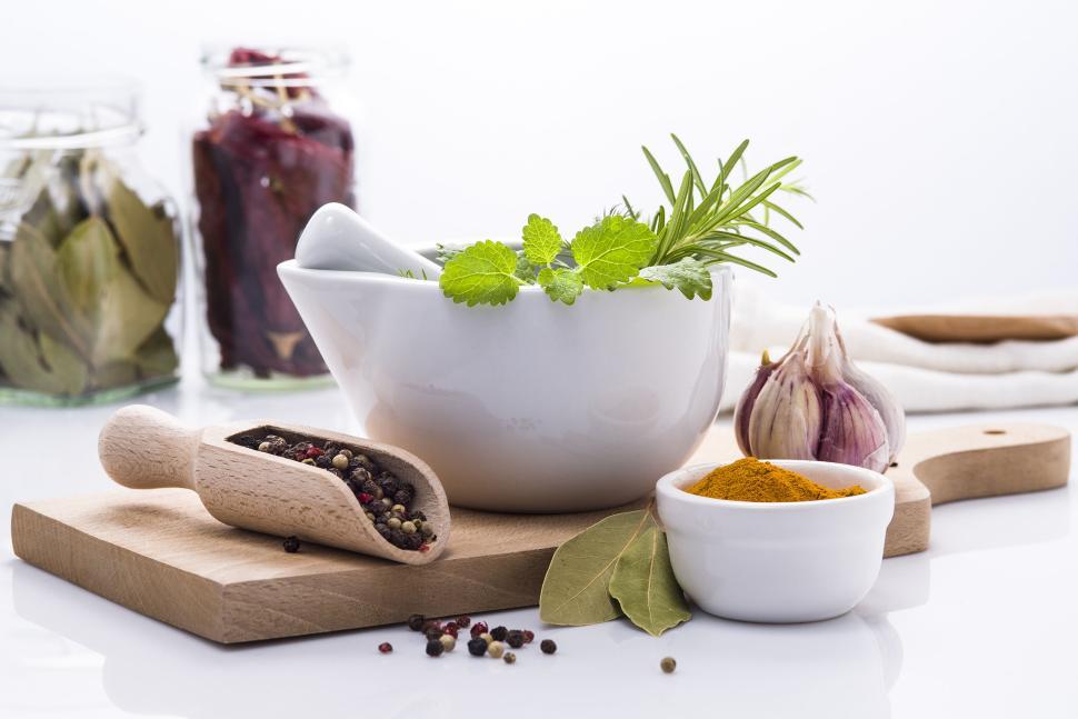 Free Image of Herbs and spices in a fresh culinary preparation setting. 