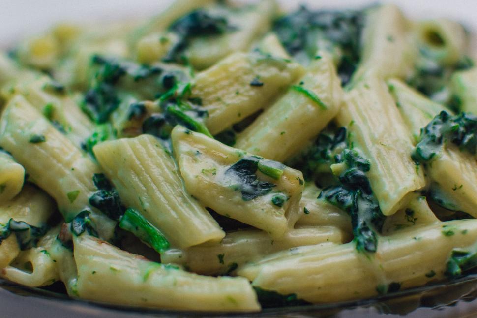Free Image of Creamy spinach and pasta dish close-up details 