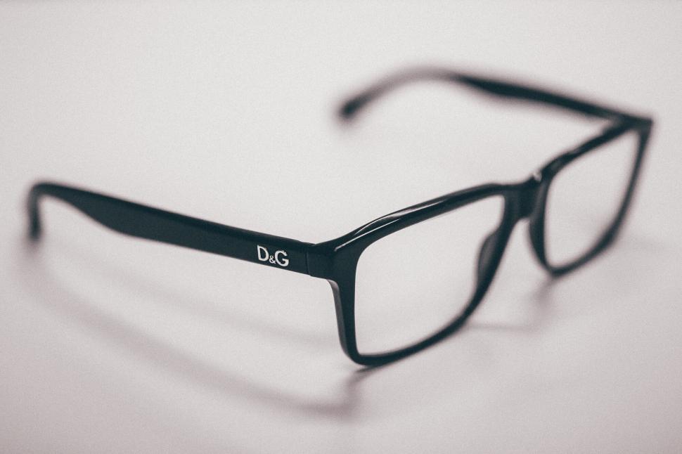 Free Image of Elegant black-rimmed eyeglasses with a clear lens. 