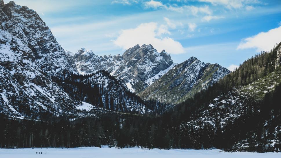 Free Image of Winter mountain range under vibrant blue sky, breathtaking. 