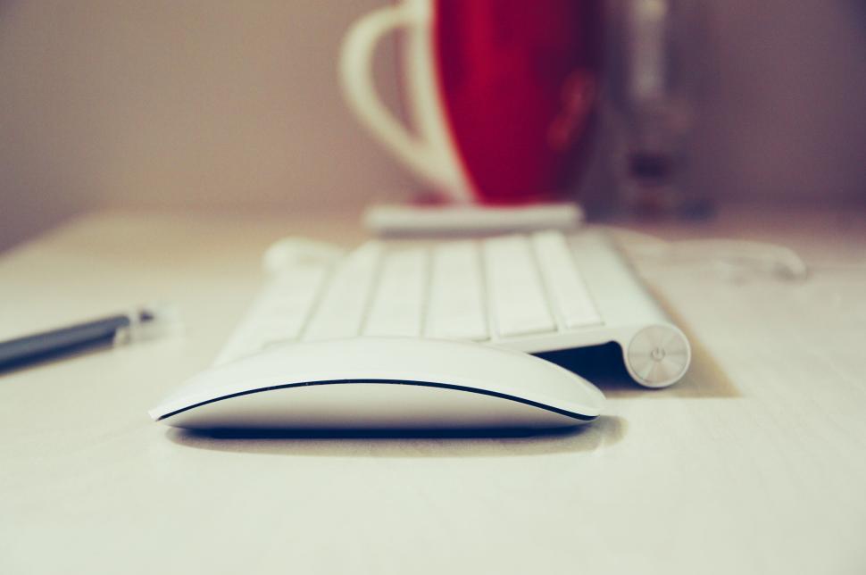 Free Image of Computer mouse and keyboard on a work desk setup. 