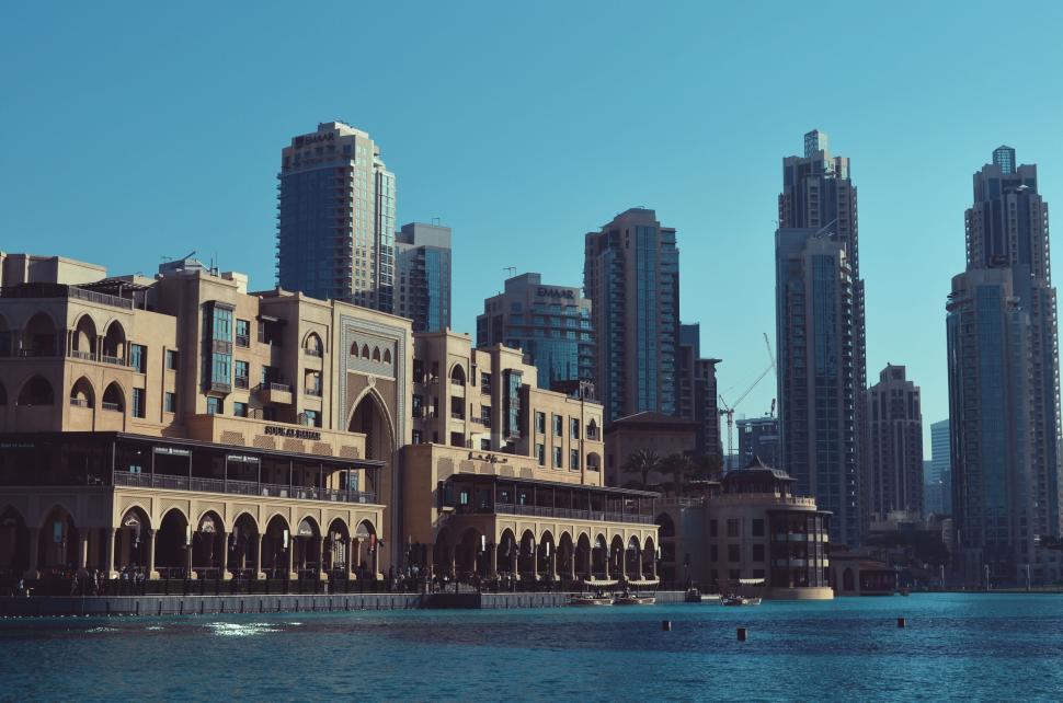 Free Image of Modern waterfront architecture with tall skyscrapers view 