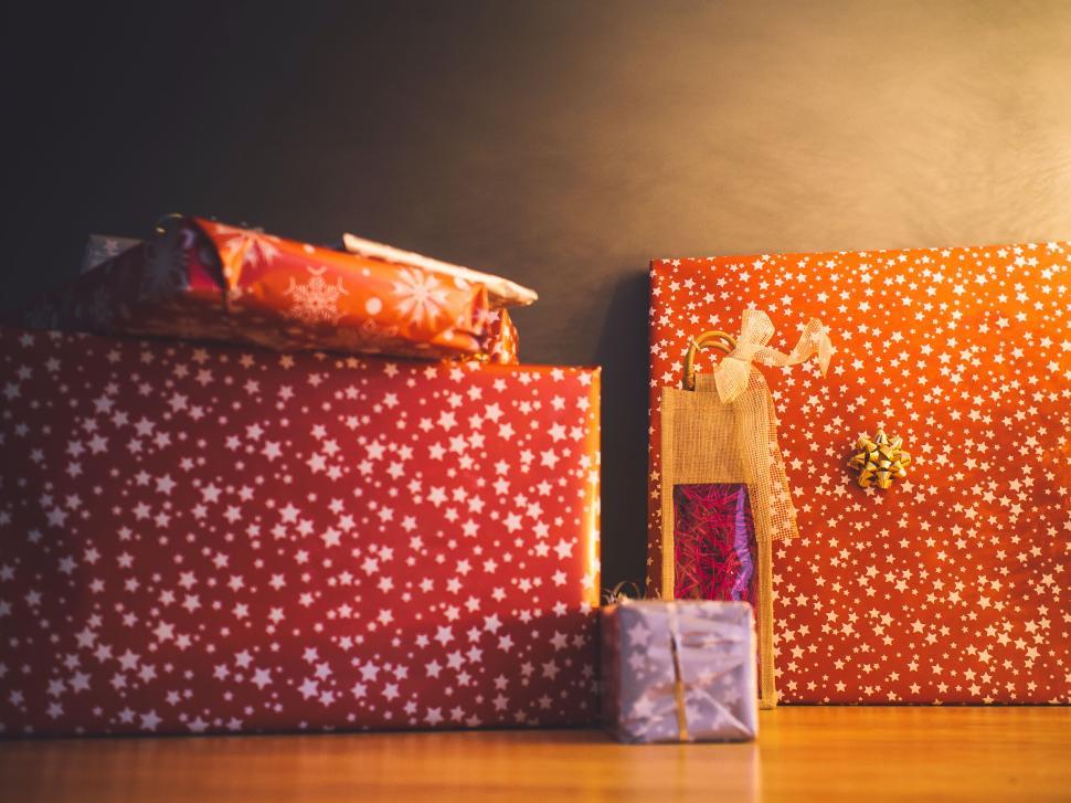Free Image of Pile of beautifully wrapped gifts in festive wrapping paper. 