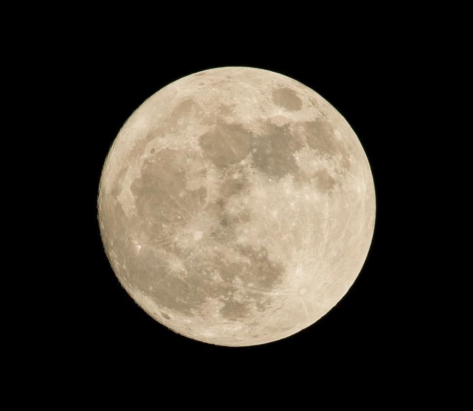 Free Image of Full moon close-up showing surface details in night sky 