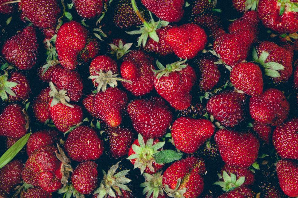 Free Image of Fresh strawberries closely packed together in bunch 