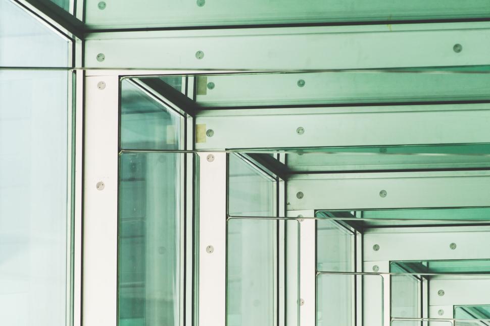 Free Image of Abstract architectural shot focusing on glass panels. 