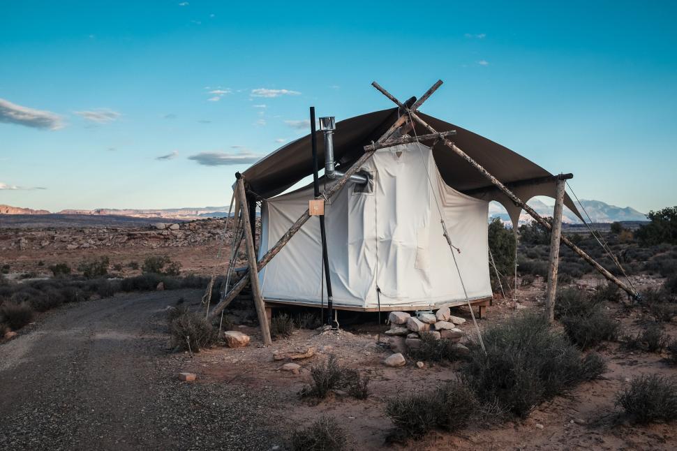 Free Image of Desert tent against blue sky in remote landscape 