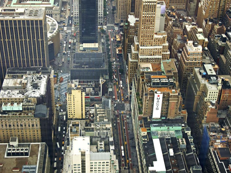 Free Image of Aerial view of a bustling city with tall buildings 