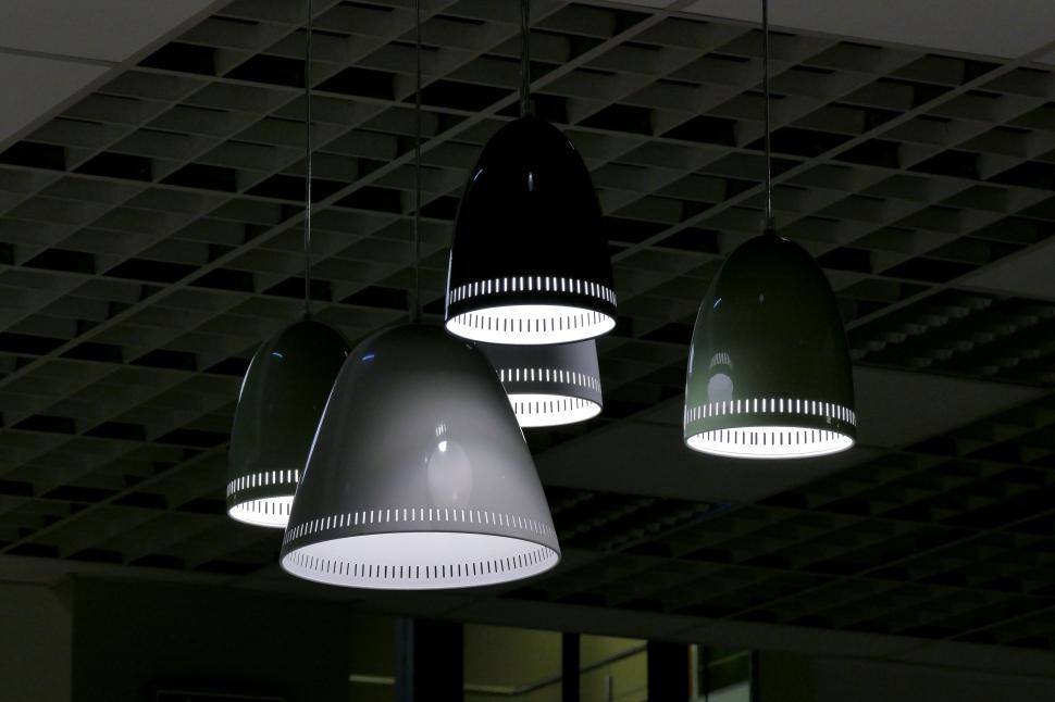 Free Image of Modern ceiling lamps in a stylish, geometric arrangement. 