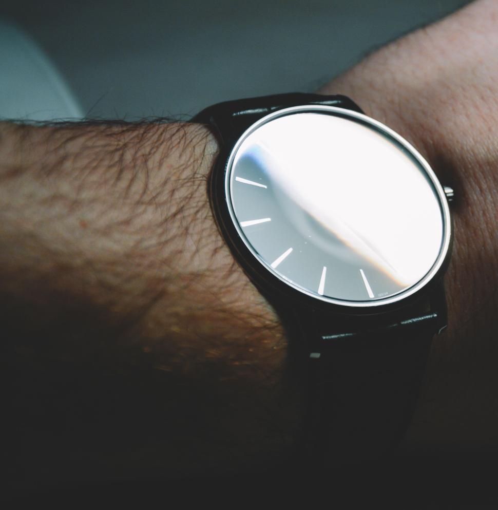 Free Image of Elegant wristwatch on a person s wrist without hands. 