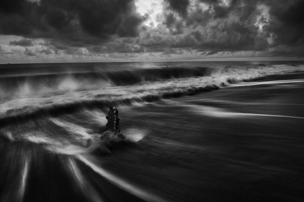 Free Image of Moody black and white seascape with dramatic waves 