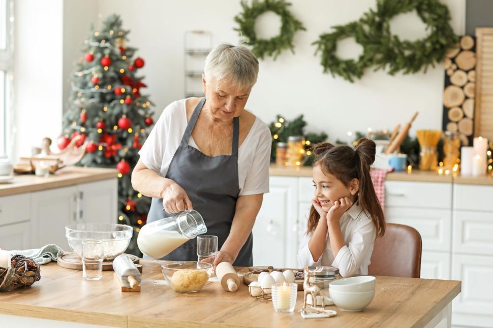 Free Image of Grandmother and granddaughter preparing for Christmas 