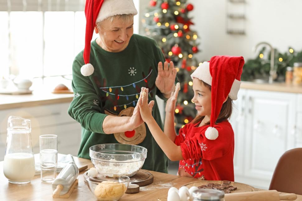 Free Image of High five shared between grandmother and granddaughter 