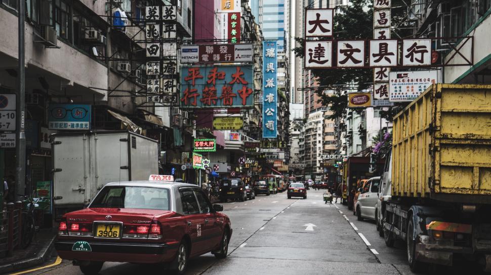 Free Image of Busy street in Asian city filled with signs and traffic 