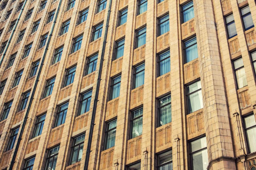 Free Image of Detailed view of a historic building with many windows. 