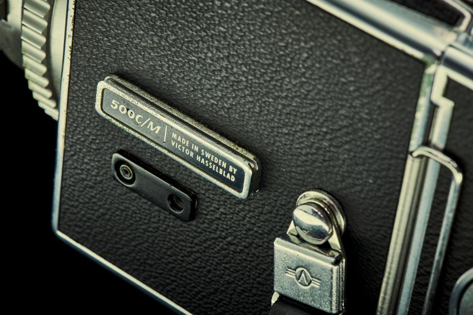 Free Image of Label on a black vintage camera with made in Sweden. 