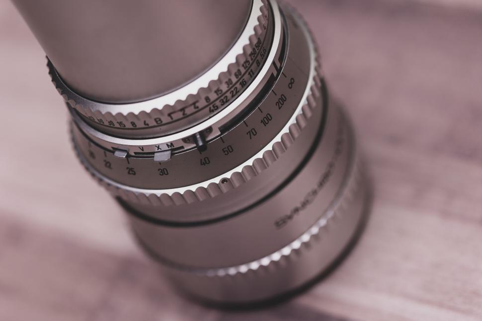 Free Image of Close-up of camera lens with focused measurement dials. 