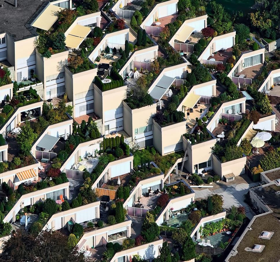 Free Image of Modern residential complex with lush green terraces 