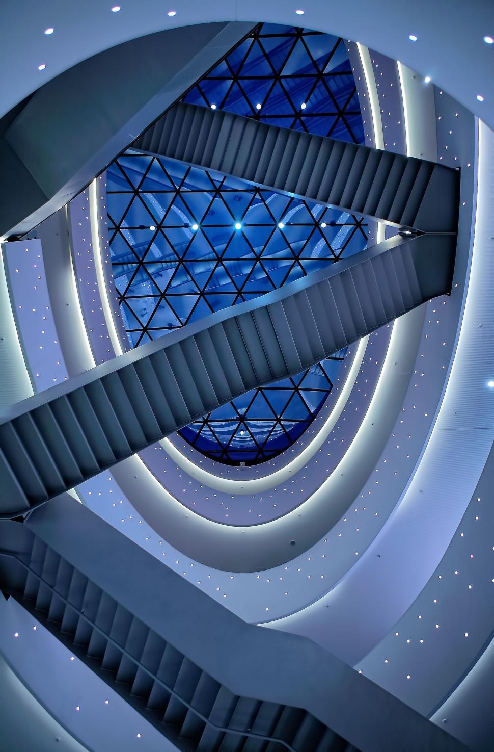 Free Image of Futuristic interior with spiral stairs and modern lighting 