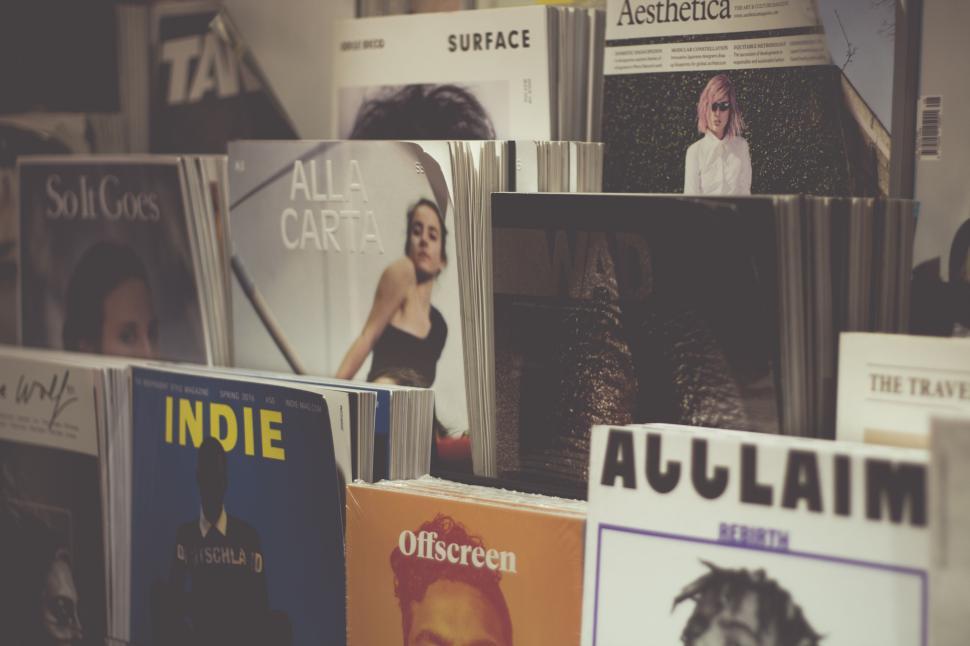 Free Image of Various magazines on a shelf in a bookstore display 