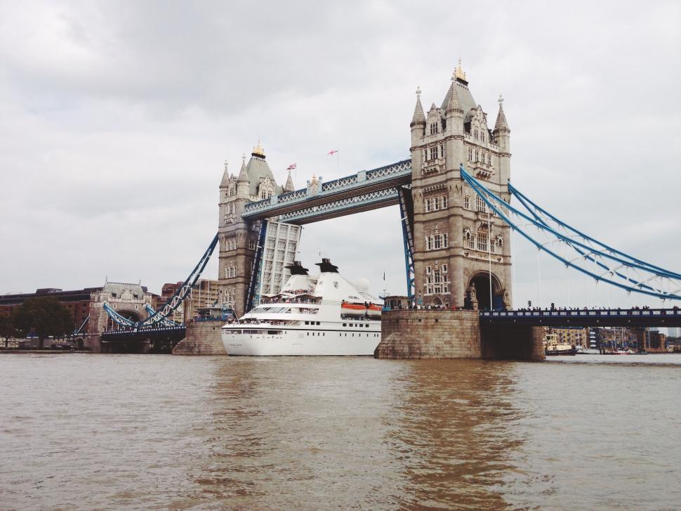 Free Image of Tower Bridge with a large ship passing through the span 