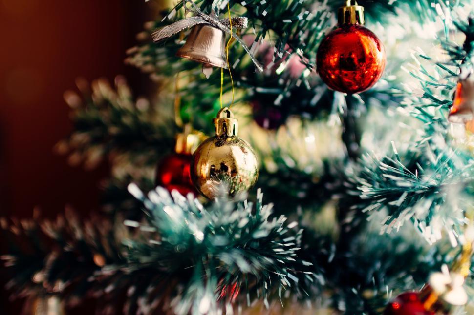 Free Image of Decorated Christmas tree with ornaments and lights 