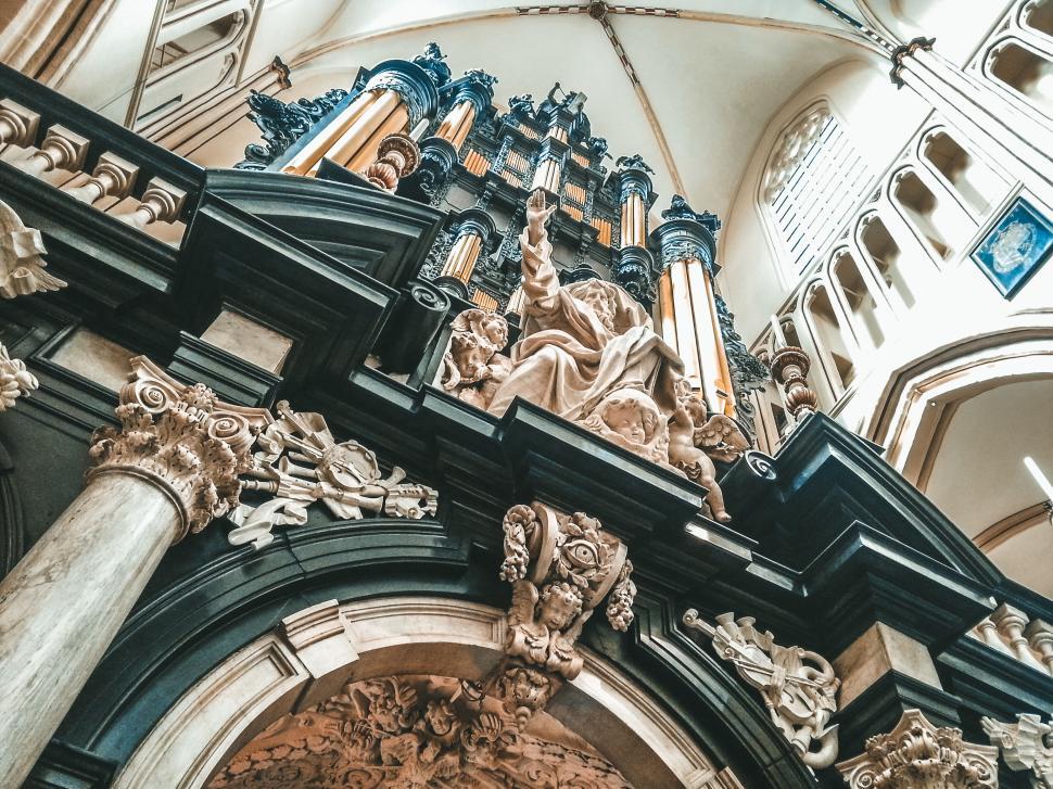 Free Image of Intricate interior of a historic building with a statue 